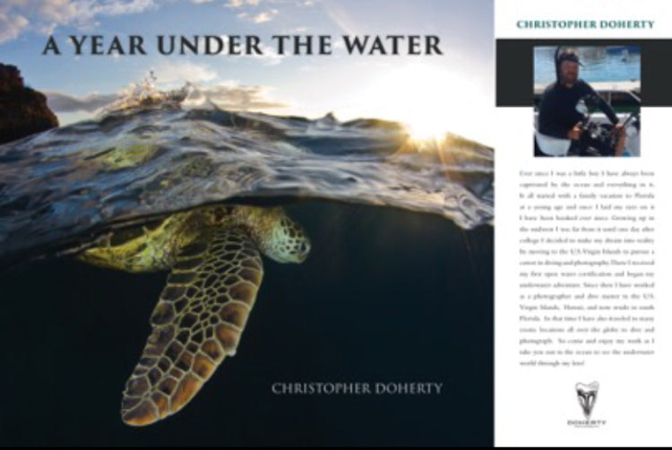 "A Year Under The Water" A 12 X 12 Hardback Photo book with 200 pages of fun from Christopher's adventures around the world!